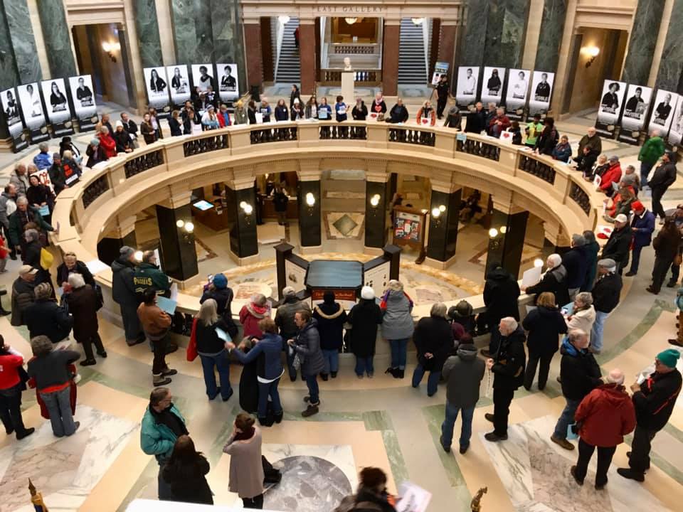 WAVE supporters gather in the rotunda at the Capitol Building in Madison during WAVE's Day of Action