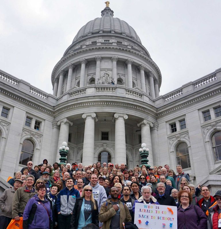Photograph of WAVE supporters in front of the Wisconsin Capitol Building