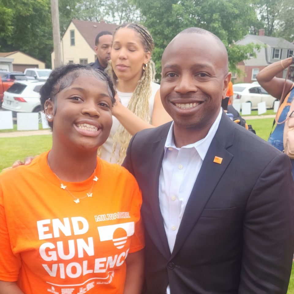 A WAVE Youth Intern poses for a photo with Milwaukee Mayor Cavalier Johnson.