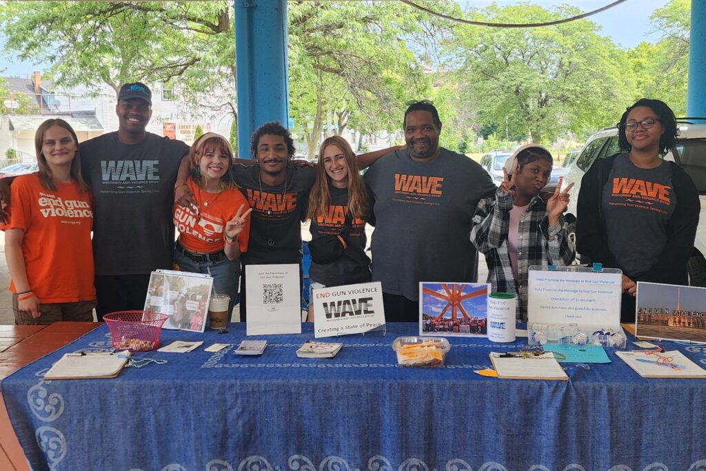 WAVE Youth interns pose at an event